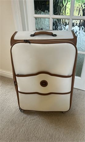 Delsey Paris 4 wheel large suitcase